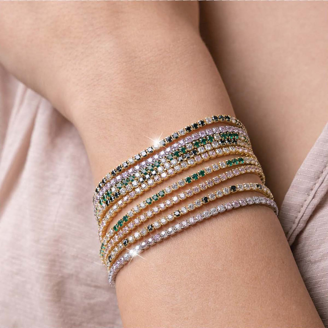 Bracciale tennis in argento dorato con zirconi rosa