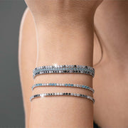 Bracciale tennis in argento con zirconi neri e bianchi alternati