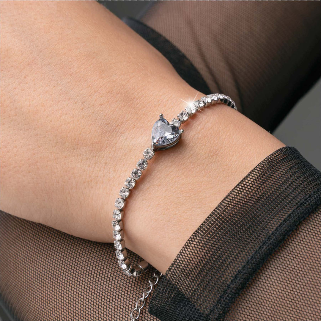 Bracciale tennis in acciaio con zirconi e cuore centrale