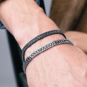 Bracciale uomo in acciaio con treccia nera in corda e acciaio