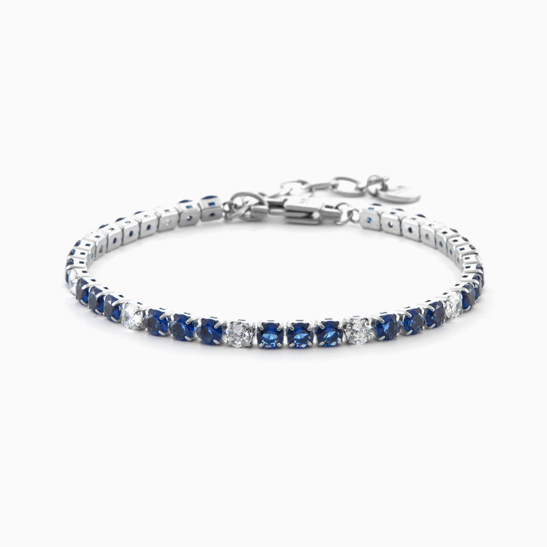 Bracciale tennis in acciaio con zirconi blu e bianchi alternati