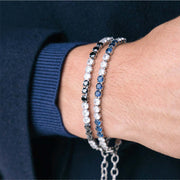 Bracciale tennis in acciaio con zirconi bianchi e blu