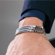 Bracciale in acciaio con zirconi blu e neri