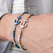 Bracciale in acciaio con ancora blu e sfere metalliche