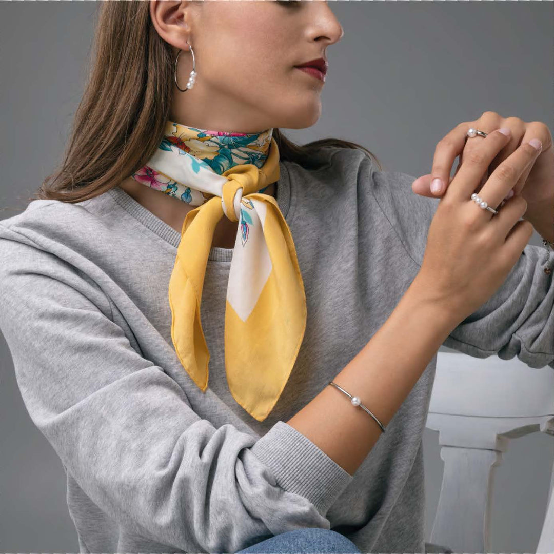 Bracciale rigido con perla bianca
