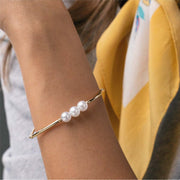 Bracciale in acciaio con perle bianche
