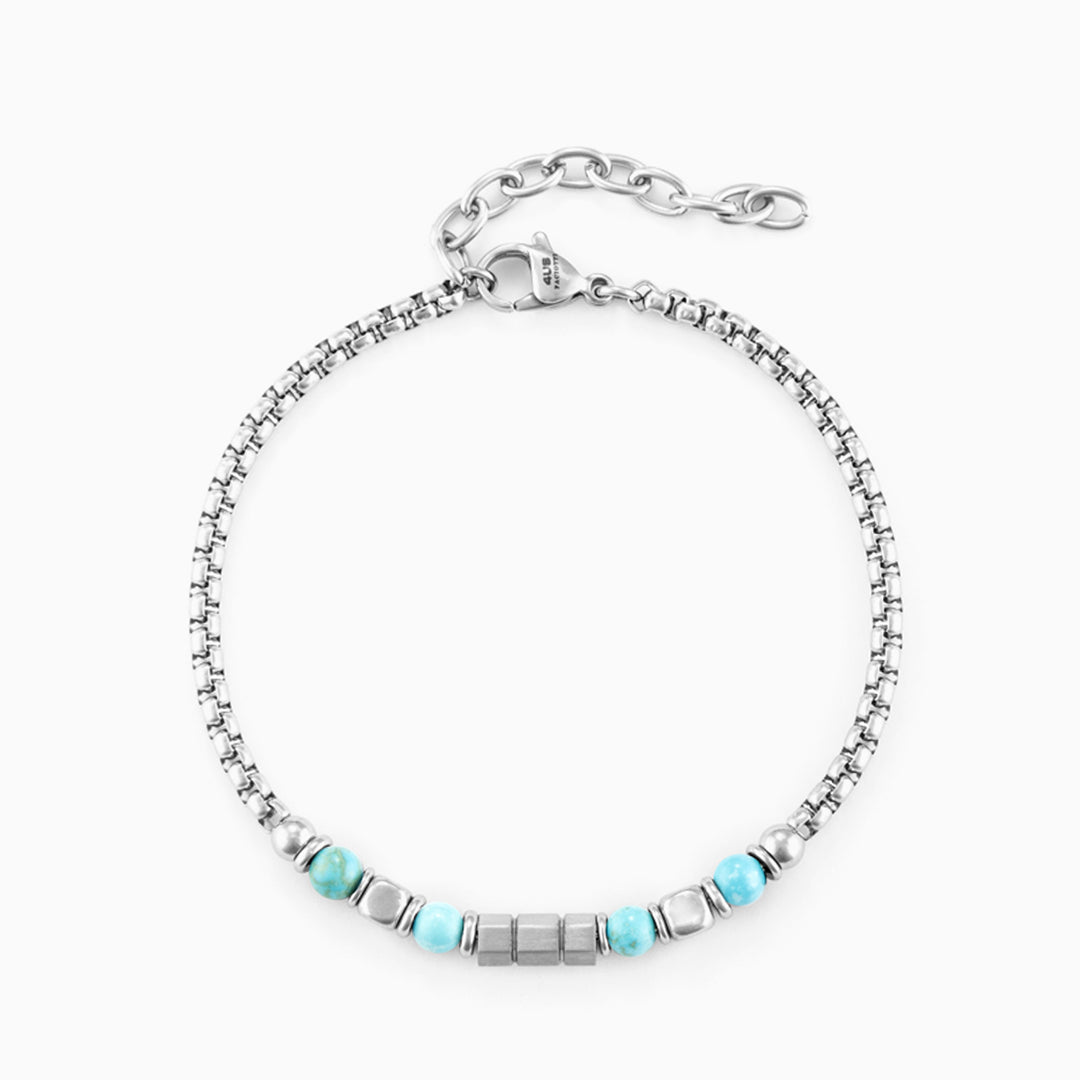 Bracciale in acciaio con pietre turchesi e inserti geometrici