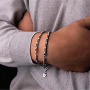 Bracciale uomo in acciaio con piastra e zirconi